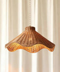 YUJIDAO 19.7 Inch Rattan Chandelier, Boho Pendant Lighting, hand-woven light fixture with adjustable cable visible in soft lighting.