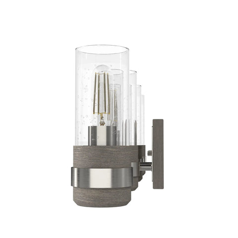 Four Light Vanity Light In Brushed Nickel Sleek Rustic Style Dimmable Fixture, clear seeded glass shades from side angle view.