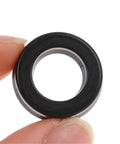 Three Piece Portable Cleaning Machine High Pressure Pump Head O Ring Set With 12x20x5mm And 12x20x5.3mm Rubber Seals, black rubber ring held by fingers