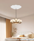 Heavy Duty White Metal Electric Hoist Lift System For Hanging Chandeliers With Cool 2-in-1 Switch, Durable 330 Lbs Load Capacity in a bedroom.