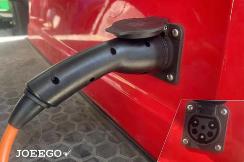 Top Shelf Ev Golf Cart Charger Cable 10 Feet Long 16 Amp 120V Plug attached to a red golf cart with detailed view of connector.