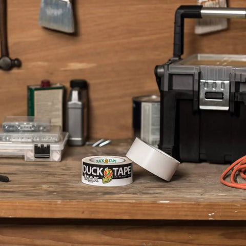 Max Strength Duct Tape Beast Mode Heavy Duty Hold With Waterproof Backing 1.88 Inch X 35 Yards White on workbench.