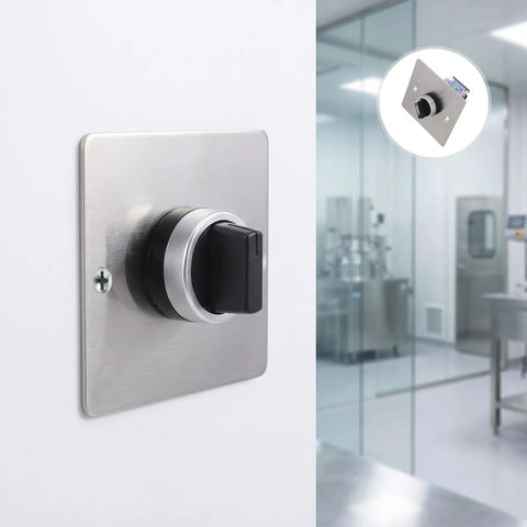 Built Like A Tank Stainless Steel Three Position Selector Switch Panel For Heavy Duty Industrial Machinery Control And Elevator Maintenance With Plug And Play Flush Mount Design on a wall with a black rotary dial.