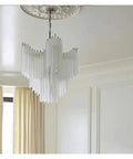 Modern Glass Pendant Light LED Hanging Lamp For Living Room Decor, elegant glass chandelier in white hanging from ceiling.