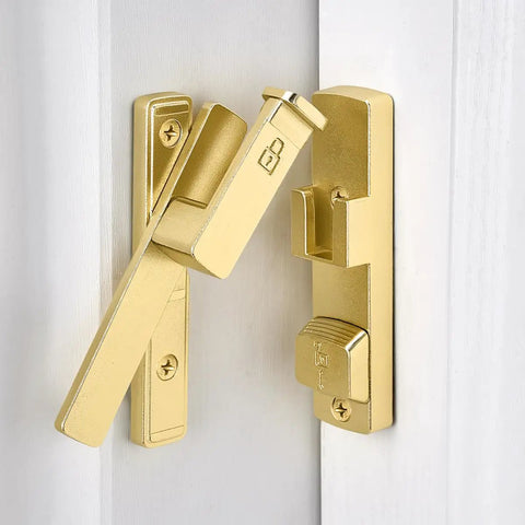Close-up of Heavy Duty Gold 90 Degree Barn Door Lock With Flip Gate Latch And Dual Secure Mounting for strong security.