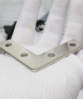 Ten Sets Of 2020 Stainless Steel T Slot Corner Brackets L Shape Joint Plates visible on gloved hand