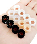Hand holding Silicone Ear Gauges Tunnels Plugs For Ears Black 8mm 0G 0 Gauge Stretching Kit For Guys And Gals Double Gauge Retainer