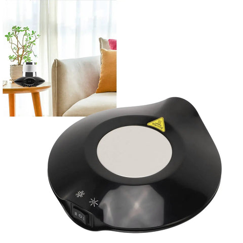 Electric Coffee Mug Warmer With Heating Cooling Cup Mat USB Drink Heater Keeps Your Morning Brew on a table near a couch.