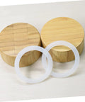 5 Pack Silicone Sealing Rings Replacement Gaskets For Coffee Pot Lids Espresso Pots And Canning Jars shown on wooden lids