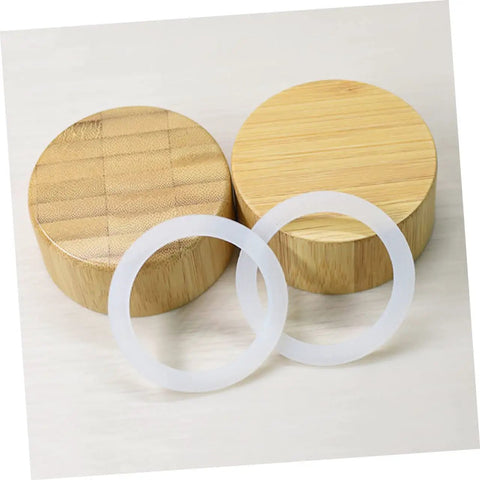 5 Pack Silicone Sealing Rings Replacement Gaskets For Coffee Pot Lids Espresso Pots And Canning Jars shown on wooden lids