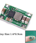 Adjustable UBEC Power Module 5V 3A Or 12V 2A For Quadcopter RC Drones, ultra-compact size shown on fingertip, green circuit board