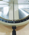 Close-up of the angle gauge on a 10 Inch 15 Amp Compound Miter Saw With Beefy 4600 RPM Motor, showing precise settings.