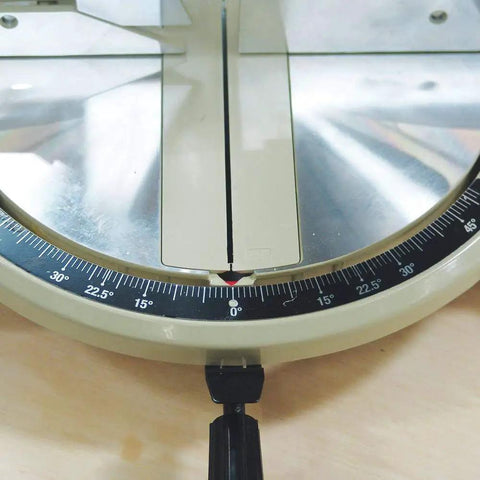 Close-up of the angle gauge on a 10 Inch 15 Amp Compound Miter Saw With Beefy 4600 RPM Motor, showing precise settings.