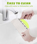 French fry cutter for potatoes with a stainless steel blade and bright green handle.