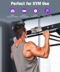 Man using Magnetic Phone Holder For Gym And Metal Surfaces With 360 Degree Rotation attached to pull-up bar
