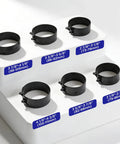 Six Piece Piston Ring Compressor Tool Set with Adjustable Rings in various sizes for cars, trucks, and motorcycles.