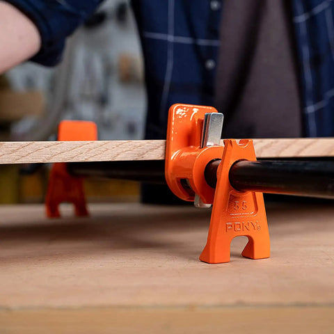Two Pack Heavy Duty Wood Gluing Pipe Clamp Fixtures For Three Quarter Inch Black Pipe Quick Adjust Pipe Clamps in use