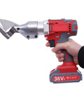 CUBELLIN 36V Cordless Electric Metal Shears Two-Speed Cutter With Dual Batteries in hand, showcasing sharp chrome vanadium blade.