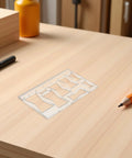 Top Shelf Bow Tie Router Template Plus Butterfly Inlay Guide on workshop table with pencil and pen for precise woodworking tasks.