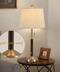 Table lamp with beige shade and grain metal wood base on round wooden table, focus on detailed design, Set Of 2 Bedside Lamps With USB Quick Charge Ports 20W QC3.0 3 Way Dimmable Touch Lamps With Built-In Fairy Lights In Modern Glass Design For Nightstands And Living Rooms.
