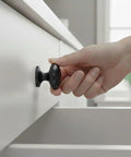 Hand pulling drawer with Matte Black Large Bifold Closet Door Knobs Four Pack With Renovation Ready Wide Base Zinc Round Kitchen Wardrobe