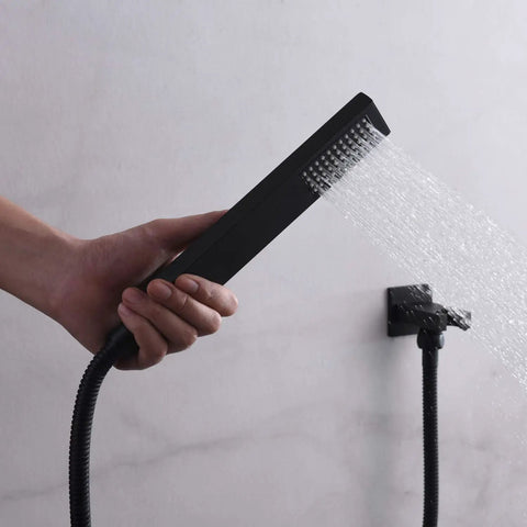 Hand holding Matte Black Rainfall Shower System With 8 Inch Shower Head Silicone Nozzles For Easy Calcium Build Up Clean Hard Water Friendly