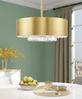 Gorgeous Six Light Pendant Featuring Brushed Nickel Drum Shade And Clear Faceted K9 Crystals over a dining table with fruit.