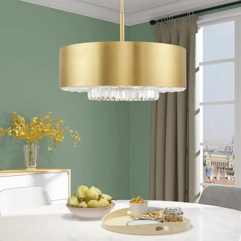 Gorgeous Six Light Pendant Featuring Brushed Nickel Drum Shade And Clear Faceted K9 Crystals over a dining table with fruit.