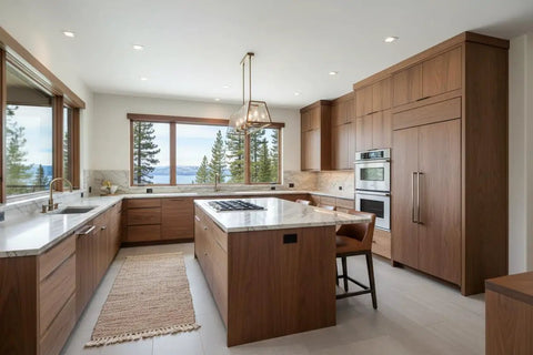 Give Your Place A Badass Upgrade Using Rustic Walnut Reactive Water-Based Interior Wood Stain, A Heavy-Duty VOC-Free Workhorse Delivering Serious Punch For Deep Rich Tones And Aged Wood Vibe On One Jumbo 55-Gallon Drum in a modern rustic kitchen with wooden cabinets and marble countertops.