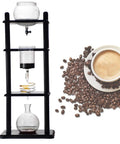 Portable Ice Drip Coffee Maker With Slow Drip Design For Brewing Smooth Cold Brew That Hits Different Every Time, glass tower with coffee beans.