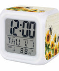 Slick Vintage Farmhouse Floral Sunflower And Bee Digital Alarm Clock With Seven Color Led Night Light Snooze Button Time Date Temperature Display Solid Pick For Bedroom Or Office Desks, showing digital display and floral design.