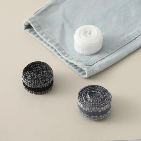 Iron On Hem Tape 5m Roll For Jeans And Heavy Fabric No Sweat Fix Quick Pants Mending Adhesive Strip Tailor Free Clothing Repair Tape in three colors on fabric.
