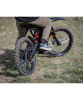 Rear Electric Dirt Bike Tire 80/90x19 Tube Type Fits Surron And Segway Talaria on bike in offroad terrain.