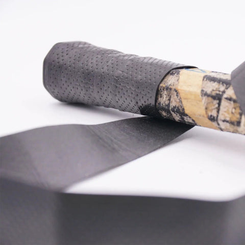 Carbon Fiber Sheet 300x200x5mm 3K Glossy Pultruded Flat Plate Plain Weave rolled around a handle, close-up view