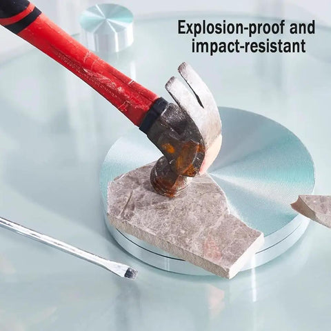 Premium Tempered Glass Lazy Susan Turntable Serving Tray For Dining Tables And Party Crews Featuring Silky Swivel Spin and No Sweat Washup At Thirty Four Inches Across, shown with a hammer hitting a stone.