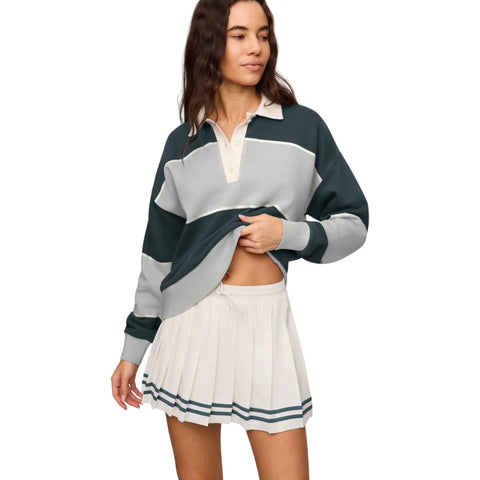 Women's Study Break Polo Sweatshirt In Feather Gray, 100 Percent Cotton With Yarn Dyed Stripe, Collared Polo Neck, Long Sleeves, Cozy Yet Polished Layer For Everyday Comfort And Effortless Style. Model wearing feather gray and dark green striped polo sweatshirt, front view