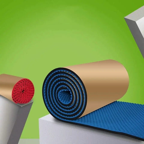 Game Changer Soundproof Acoustic Panels Cut From Dense Cotton Foam For Home Studios And Drum Rooms In Dark Gray To Neutralize Noise And Keep Your Tracks Tight, featuring rolled blue and red foam.