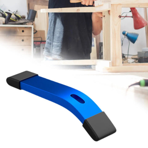 Deep blue anodized aluminum T Slot Hold Down Clamp for aluminum workholding and precision milling on a wooden table