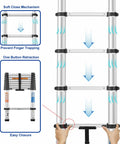 Hands demonstrating the one button retraction feature of the 8.5 Foot Aluminum Telescoping Ladder With One Button Retraction Easy Pull Portable Foldable Extension Ladder For Home RV Camping Attic Lightweight Compact Design 330 Pound Capacity