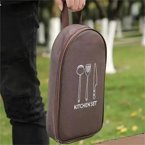 Person holding Outdoor Cutlery Portable Set for Camping and Picnics with Secure Pouch and Built In Elastic Slots Keeps Utensils From Shifting.