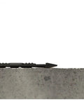 Side view of OutFront Reversible Outdoor Entrance Mat For All Weather Tough Rubber Mat With Flexible Scrapers on concrete