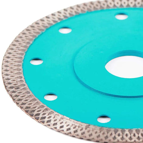 Close-up of Ultra Thin Diamond Tile Blade 4.5 Inch with turbo mesh rim for porcelain ceramic stone cutting