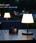 Cordless USB Rechargeable Table Lamp With 4000mAh Battery, 2700K Warm LED on a patio table at dusk