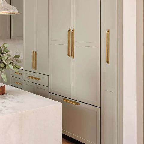 Game Changing Antique Brass Cabinet Pulls and Drawer Handles, 5 Inch Hole Center Zinc Alloy Kitchen Hardware With Vintage Backplate and Spacer, shown on cabinets.