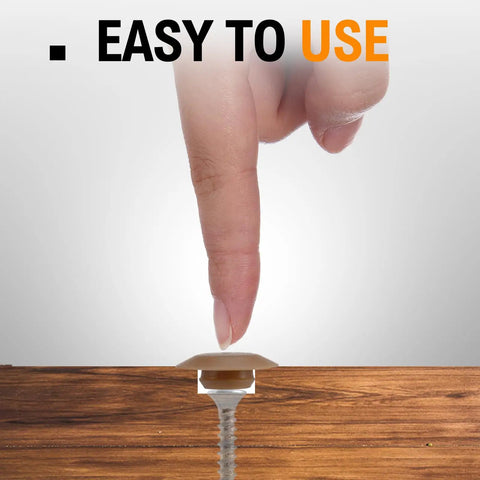Twenty Piece Light Oak Door Threshold Screw Covers And Adjustable Sill Cap Plugs demonstrated by finger pressing on a cap.