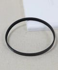 Top Notch 8439-01 Serpentine Drive Belt Replacement For Turbo Cat EX Series Vacuum Power Nozzle on fabric background.