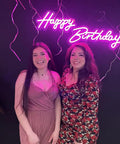 Pink Happy Birthday Neon Sign With Dimmer For Party Decoration And Bedroom Wall Decor, two women in front