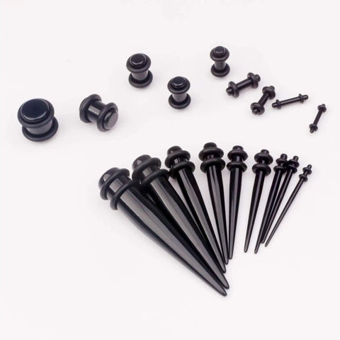 Starter Pack For Ear Stretching 50 Piece Kit With 14G To 00G Acrylic Tapers And Plugs Silicone Tunnels displayed on white background.