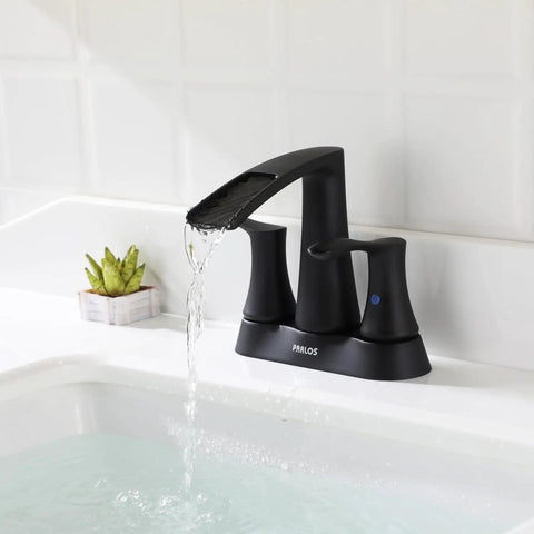 Two-Handle Waterfall Bathroom Faucet In Matte Black With Pop-Up Drain And Metal Supply Lines For Quick Install And Sleek Open-Channel Spout Vibe For A Modern Bath Upgrade, water flowing into sink