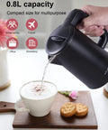 Pouring water from Compact 0.8L Electric Kettle Stainless Steel 800W Fast Boil Auto Shut Off Portable Water Boiler into a cup